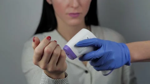Covid-19 temperature checkpoint. Scientist in protective suit checking screening Stock Footage 144424952