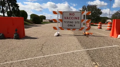 Covid 19 Testing Road Coronavirus Sign No Vaccine 4K Wide Angle Video stock 160238499