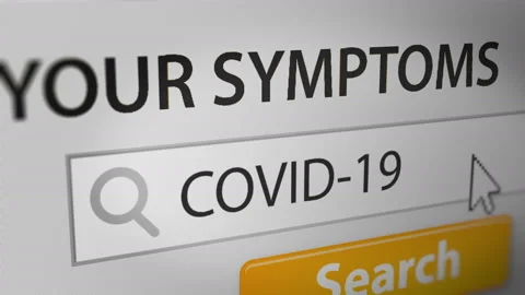 "Covid-19" Typing into Search Engine (Symptom Checker) on Computer Screen Stock Footage 140170676
