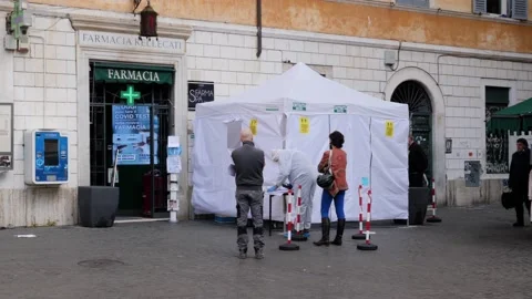 Covid-19 virus tend test. People waiting to make covid test Stock Footage 143786002