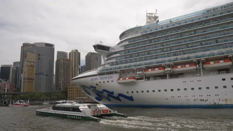 Covid hit Ruby Princess full tracking shot of cruise ship docked in Sydney Stock Footage 164010554