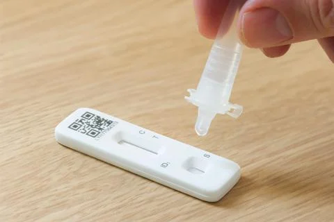 Covid LFD (LFT) testing, Covid-19 rapid lateral flow test strip Stock Photos