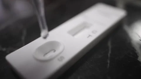 Covid Rapid Test Dropping Sample Slowly Stock Footage 335426150