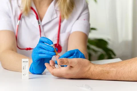 Covid rapid test. Negative test result by using rapid test device for COVID-19 Stock Photos