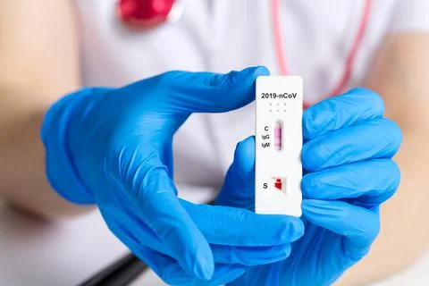 Covid rapid test. Negative test result by using rapid test device for COVID-19 Stock Photos