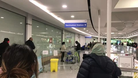 Covid Vaccination Queue in a pop up center Stock Footage 167285288
