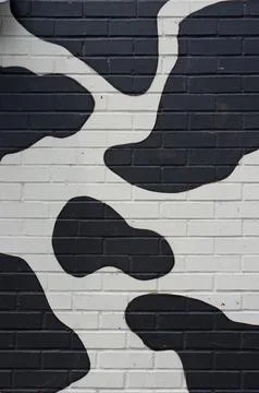 The cow brick wall Stock Photos
