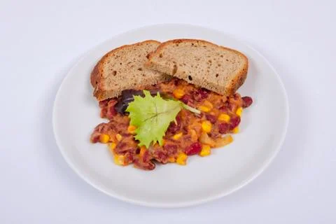 Cowboy beans with bread on a white Foto stock
