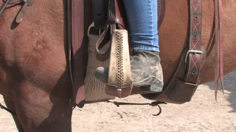 Cowboy boot in stirrup Stock Footage 67812881