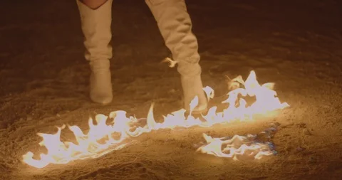 Cowboy boots in fire Stock Footage 127129801