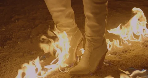 Cowboy boots in fire Stock Footage 127129843