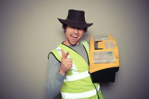Cowboy builder with tool box Stock Photos