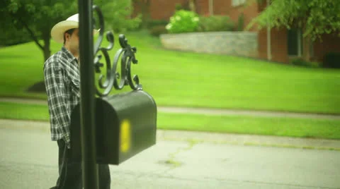 Cowboy checking mail check Stock Footage 26196362