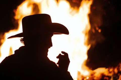 Cowboy in the fire with copy space Stock Photos