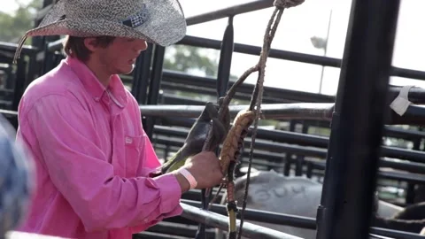 Cowboy getting his rope ready Stock Footage 143820488