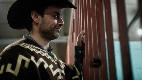 Cowboy Looking into a jail Stock Footage 244865150