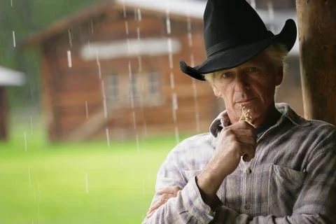 Cowboy In The Rain Foto stock