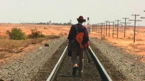 Cowboy Walks Railroad Tracks Away From Stock Video Pond5