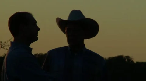 Cowboys at sunset Stock Footage 6930594
