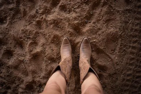 Cowgirl boots in the dirt Stock Photos
