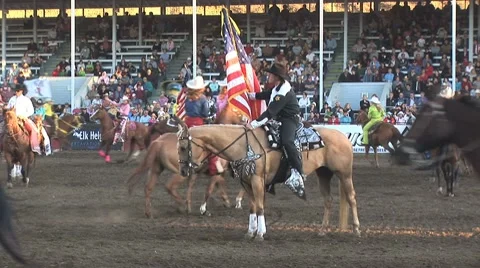 Cowgirls and flag Stock Footage