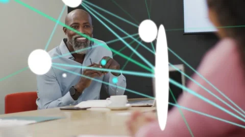 Coworker gesturing sparking node overlay while man leaning, pointing pen, Stock Footage 333397054