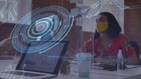 Coworker pointing at laptop causing animated chart, woman writing on glass Stock Footage 334703250