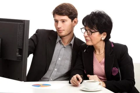 Coworkers analysing computer data Stock Photos