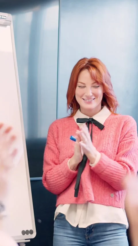 Coworkers applauding the presentation of a project Stock Footage 271174993