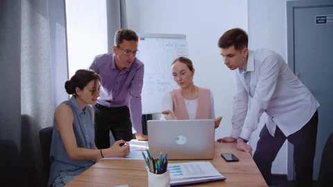 Coworkers Debating Project Ideas During Workplace Meeting Stock Footage 339608276
