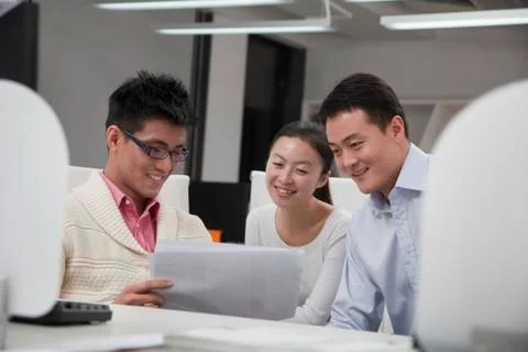 Coworkers discussing project Stock Photos