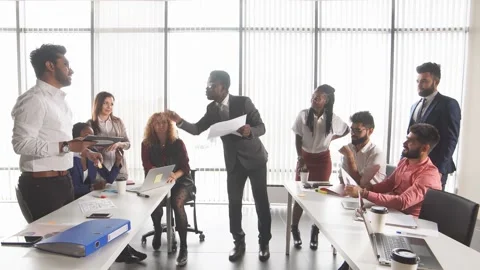 Coworkers discussion. Two groups of managers proving their points of view Stock Footage 166611006