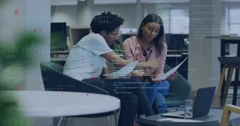 Coworkers leaning and pointing documents, code overlay highlighting for business Stock Footage 334114425