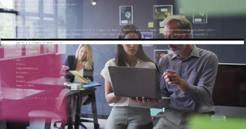 Coworkers opening laptop causing code glitches appearing and fading for business Stock Footage 326758747