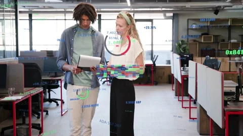 Coworkers reviewing tablet data, tapping causing AR charts appearing, woman Stock Footage 332900359