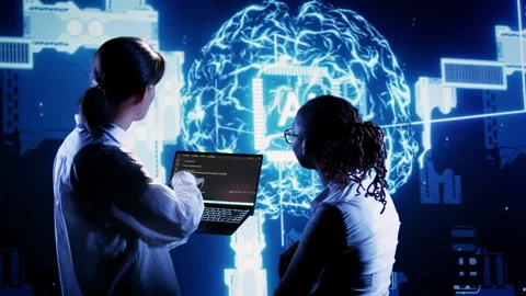 Coworkers run AI code in data center Stock Footage 251592331