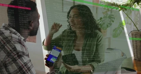 Coworkers showcasing technology app UI initiating code overlay around smartphone Stock Footage 316701531