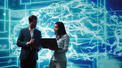 Coworkers solving tasks on laptop and tablet, running AI software Stock Footage 278700156