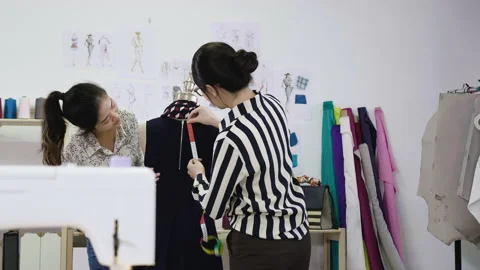Coworkers in workshop working with mannequin. Video stock 136448363