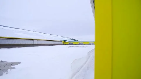Cowshed is yellow. A building for keeping cows in winter during the cold se.. Stock Footage 321241422
