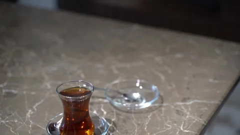 Cozy 4K Tea Cup by Fireplace - Relaxing Winter Ambiance Video stock 301448679