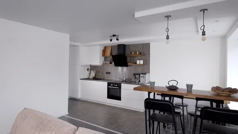 Cozy and spacious studio apartment with modern minimalistic interior style with Stock Footage 124635803