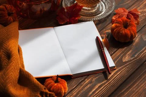 Cozy Autumn Scene With Open Notebook Pumpkins And Warm Beverage For Seasona.. Stock Photos