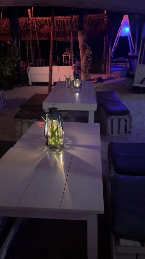 Cozy beach restaurant night view lantern on table Paje Zanzibar HD vertical Stock Footage 342148205