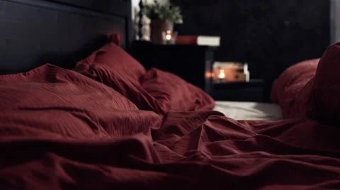 Cozy bed in a nice bedroom. Stock Footage 42175729