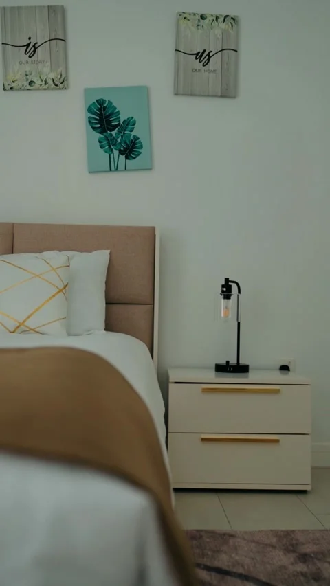 Cozy bed in a warm apartment Stock Footage 263010908