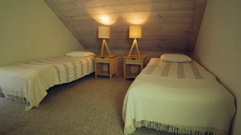 Cozy Bedroom with Two Single Beds. Stock Footage 270352562