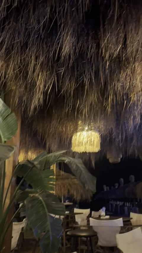 Cozy Boho Beach Bar Terrace with Wicker Lamps at Night in Golem Albania Vidéo 343391662
