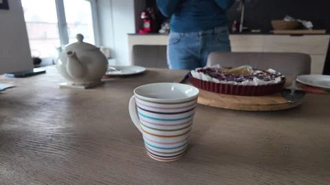 A Cozy Breakfast Scene Featuring Delicious Coffee and Dessert for Ultimate Stock Footage 311566480