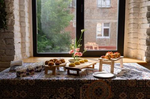 A cozy buffet table with baked goods and snacks Stock Photos